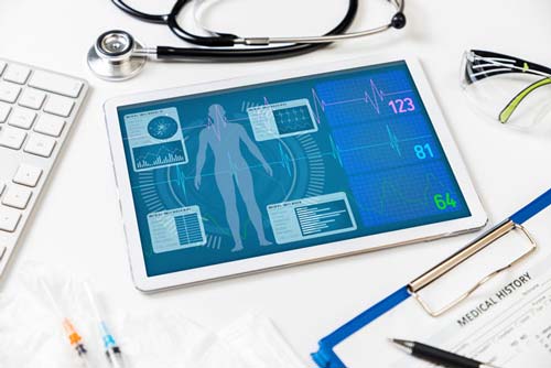 Vital sign monitor in tablet PC, medical technology concept