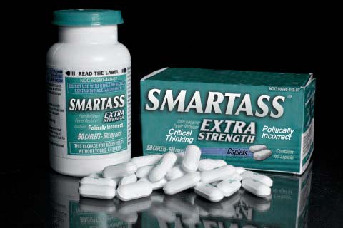 Pills along with the and bottle of medication titled "SMARTASS"